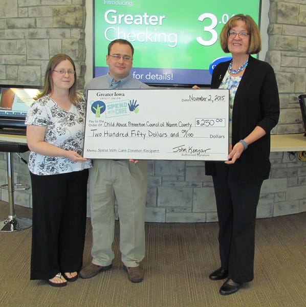 Greater Iowa Members Maxine and Scott Irish present Colleen Reisener $250 donation.